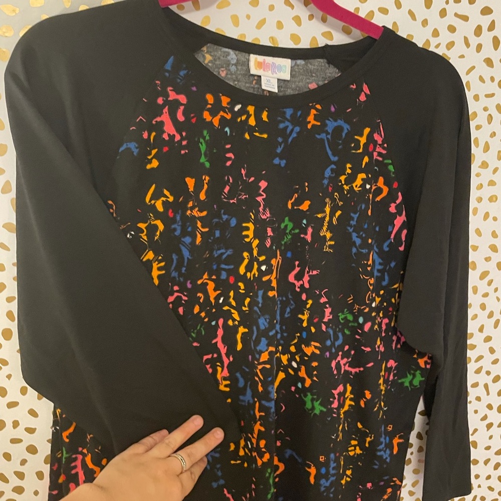 “Randy”Lularoe Tee multi colored
